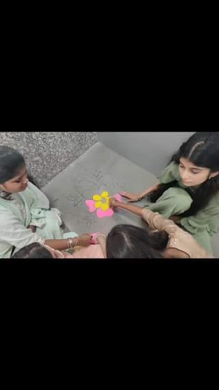 AS learners while doing Rangoli Practice in Class.